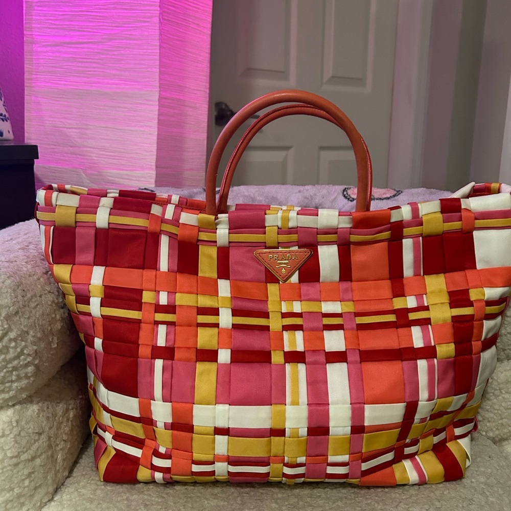 Beautiful vintage prada nylon woven xl tote. Ordered bag but never used it.